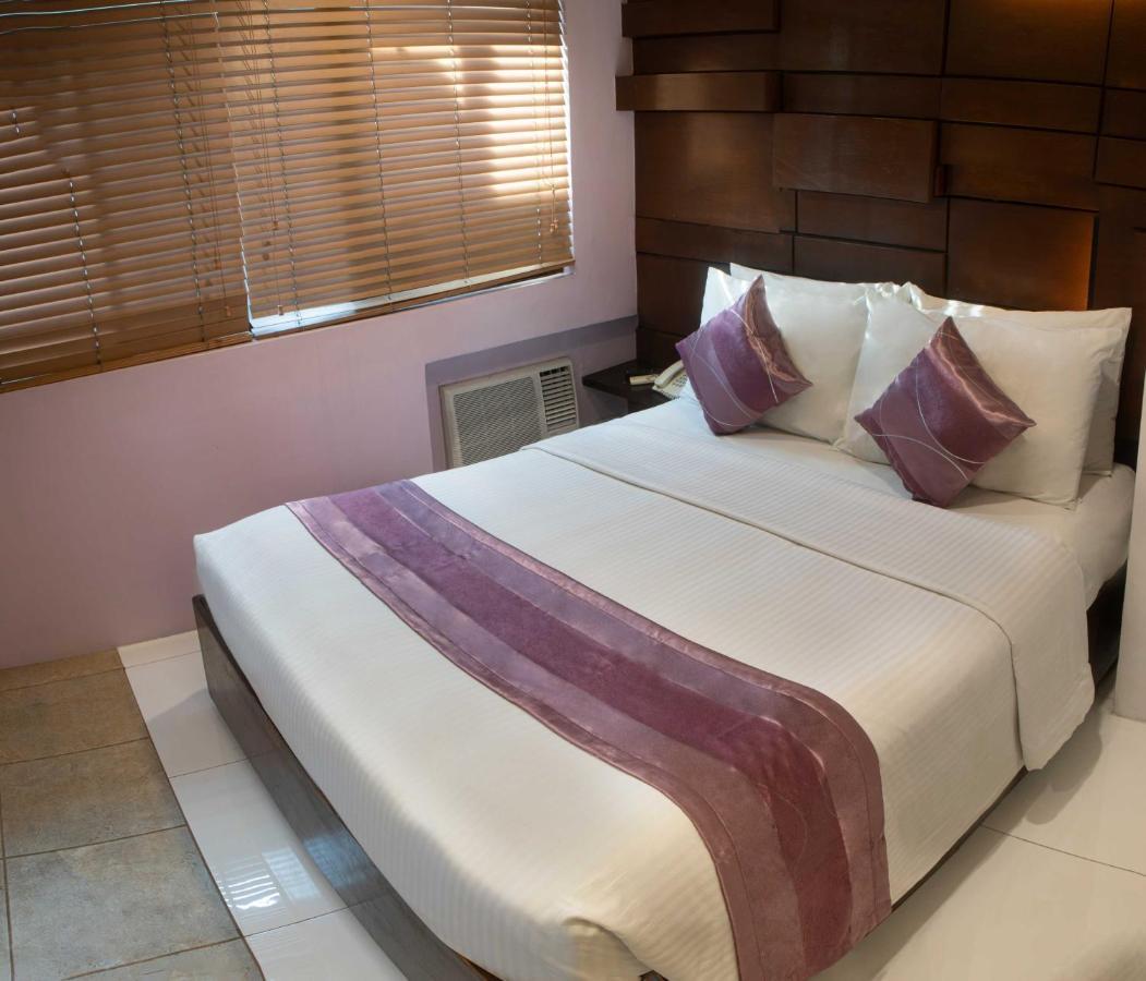 Acl Suites Quezon City Dış mekan fotoğraf